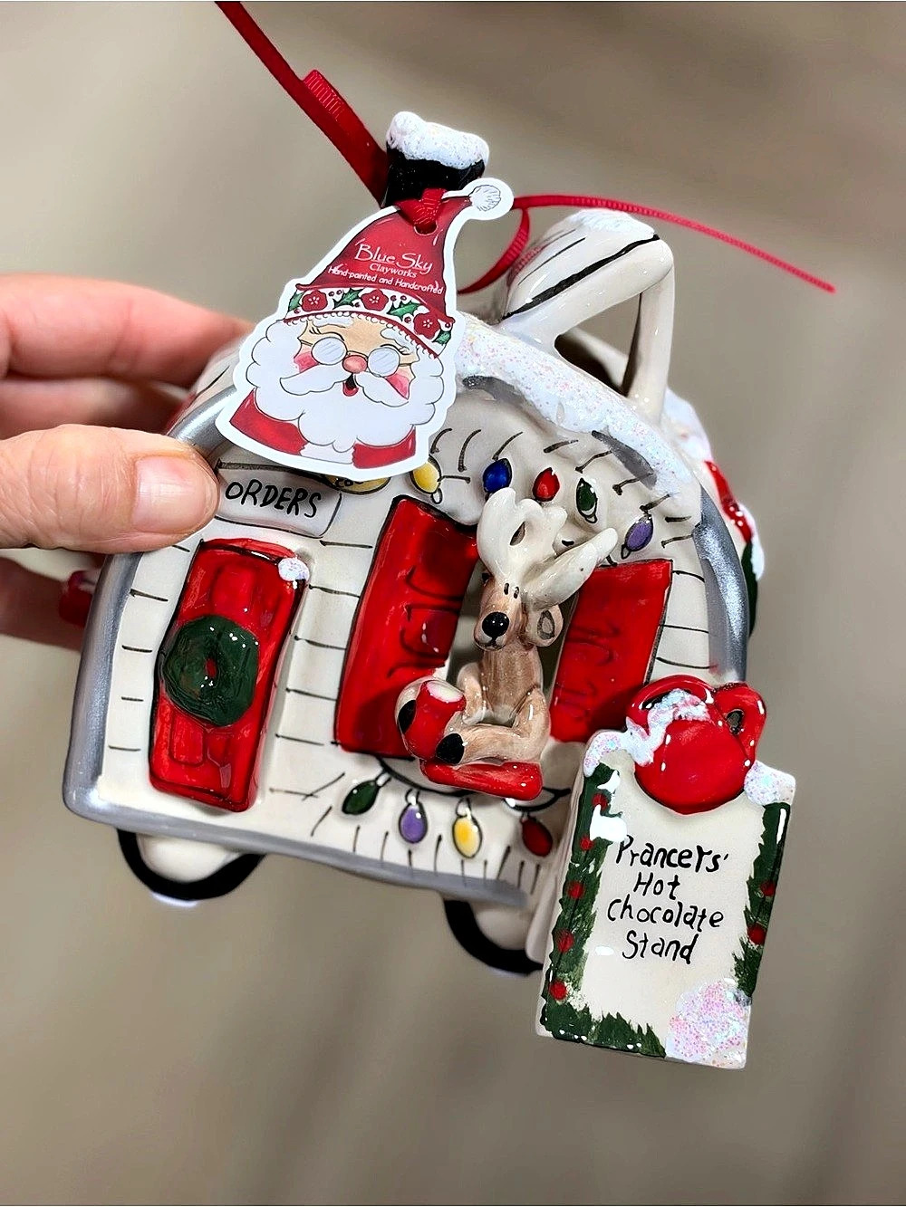 Blue Sky Clayworks Prancer's Hot Chocolate Stand Camper Ornament White & Red